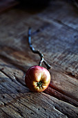An apple on a wooden background