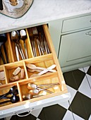 organized opened cutlery drawer
