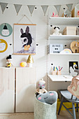 Desk in contemporary child's bedroom in pastel shades