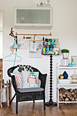 Black wicker chair and standard lamp with DIY lampshade
