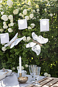 Handmade, lace butterfly decorations above table