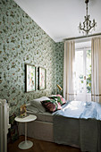 Vintage-style floral wallpaper in classic bedroom