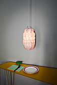Lampshade handmade from bottle and plastic spoons