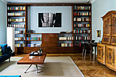 Bookcase, work station and antique cabinet in living room