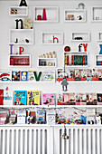 Books, toys and letters in shelf modules and on picture ledges