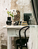 Vintage-style accessories n on shabby-chic dressing table