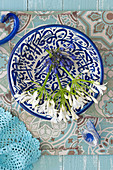 Blue and white agapanthus on blue-and-white dish