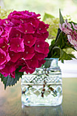 Glass vase of hydrangeas