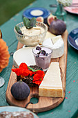 Cheeseboard with blueberry cream cheese and hummus