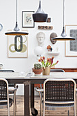 Classic pendant lights above a dining table