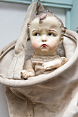 An antique doll as a decoration