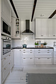 A white Scandinavian-style kitchen