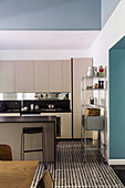 A bright fitted kitchen with an island