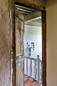Old wooden door between bedroom and hallway