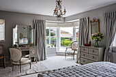 Master bedroom with a Gustavian dressing table