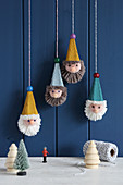 Suspended gnome decorations handmade from egg boxes and wool