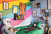 Rainbow colours on wall of child's bedroom