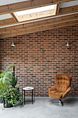 Cosy seating area against brick wall