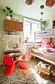 Children's bedroom with bunk bed, deep-pile rug and classic children's chairs