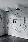 Double shower with marble wall