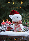 Snowman with santa hat and bow
