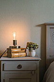 Bedside table with vintage table lamp