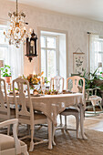 Dining area with set table in country style