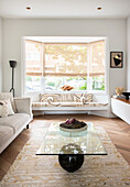 Black and white bench in the bay window in the minimalist living room