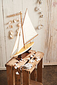 Flotsam and jetsam decorations and a decorative sailboat