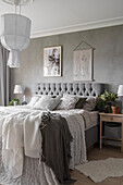 Double bed in grey bedroom