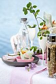 Festively set table by a lake