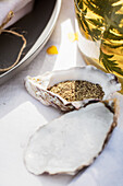 Peppercorns in an oyster shell