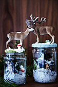 Mini winter wonderland with forest animal snow globes built in preserving jars