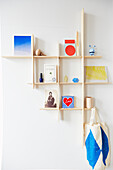 DIY wall-mounted shelves made of wooden boards