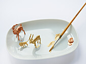 Painting reindeer figures with gold and bronze colours