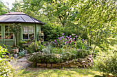 Garden shed and flower bed with border