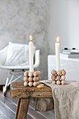 DIY candle holders made of wooden balls