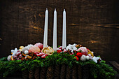Christmas interior plant based composition with candles
