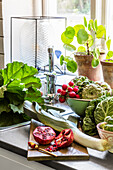 Fresh vegetables and fruit on kitchen counter