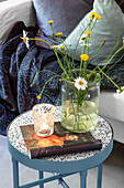 Side table with bouquet of flowers