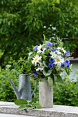 Summer bouquet of daisies and cornflowers