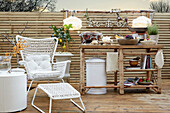 White rattan furniture with bamboo table on balcony