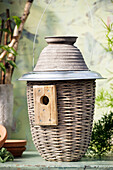 DIY bird nesting box made from a basket