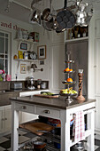 Kitchen worktop with cake stand and pan rack