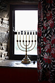 Candelabra on slate window in County Claire cottage window
