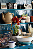 Homeware on blue painted kitchen dresser in Lincolnshire home, England, UK
