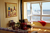 Window seat in beach house living room Cromer in Norfolk, England, UK