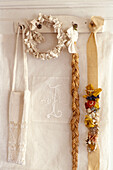 Peg board with linen bag fabric wreath and hanging ornaments