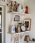 Kitchenware displayed on kitchen shelves