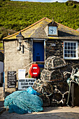 Lobster pots and fishing nets in Port Issac harbour Cornwall